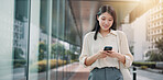 Phone, travel and woman in city typing for networking, communication or typing email on vacation. Cellphone, contact and Japanese female person reading online blog for holiday tips or advice in town.