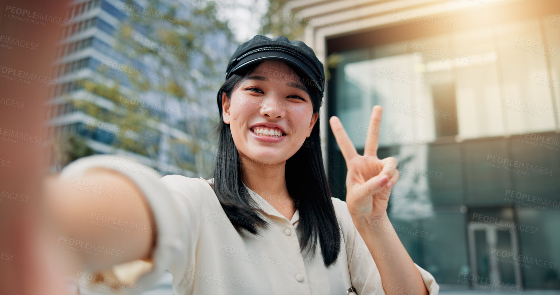 Buy stock photo Asian woman, portrait and selfie with peace sign in city for picture, photography or memory. Japan, female person or tourist with smile, emoji or hand gesture for capture or moment in an urban town