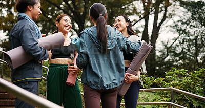 Buy stock photo Outdoor, friends and smile with conversation at yoga session for health, self care or support in Japan. Park, people and happy with discussion on stairs for fitness, exercise or workout for wellbeing