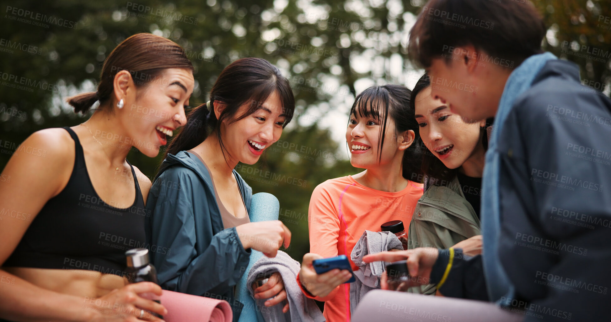 Buy stock photo Yoga, surprise and people with smartphone, fitness and research for poses, guide or videos with instruction. Outdoor, joy and group with mobile for routine, shocked or social media with tips in Japan