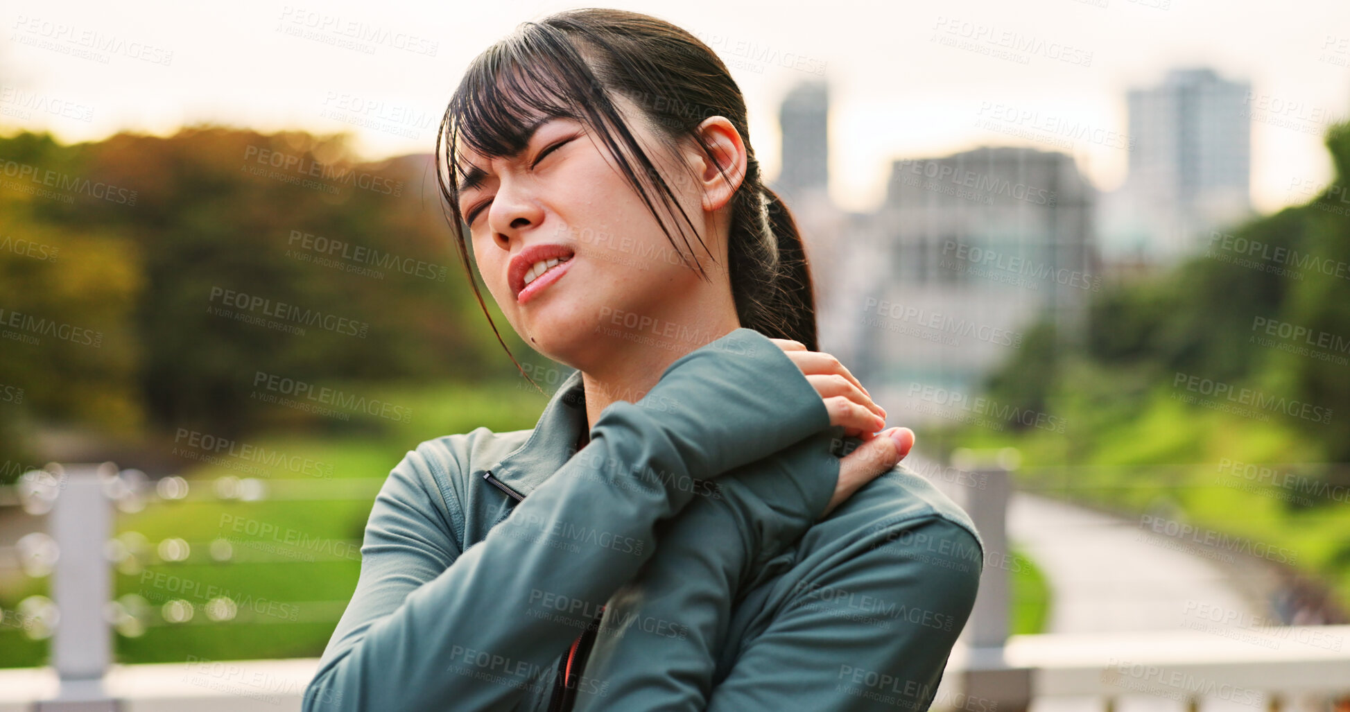 Buy stock photo Outdoor, woman and fitness with neck pain from workout strain with muscle ache and injury in Japan. Female person, exercise and active with inflammation or sore for self care, health and wellbeing