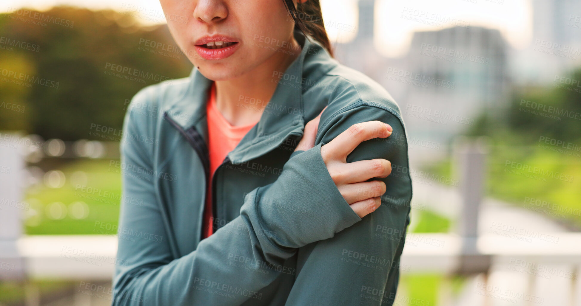 Buy stock photo Outdoor, woman and fitness with shoulder pain from workout strain with muscle ache and injury in Japan. Female person, exercise and active with inflammation, fracture and sore on training as runner