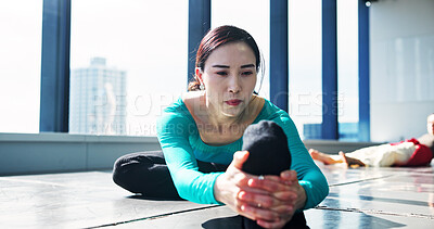 Buy stock photo Dancer, fitness and girl stretching legs for body health, start and prepare for performance in Japan. Warm up, flexibility and woman in studio to exercise back, muscle wellness or practice on floor