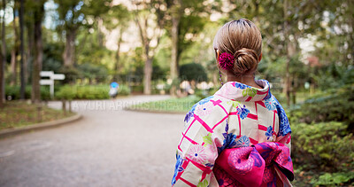 Buy stock photo Back, Kimono and road with woman in park to explore green location for sightseeing or tourism. Fashion, travel and walking with person outdoor in nature of Japan for culture, holiday or vacation