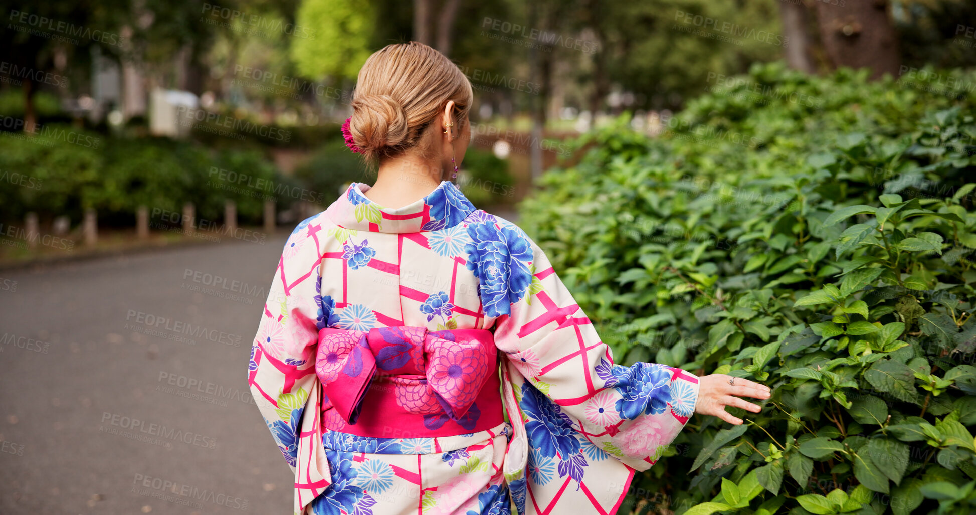 Buy stock photo Back, woman and walking with kimono in park, Japanese culture and journey for sightseeing outdoor. Nature, female person and traveler with fashion for indigenous clothes, vintage style and travel