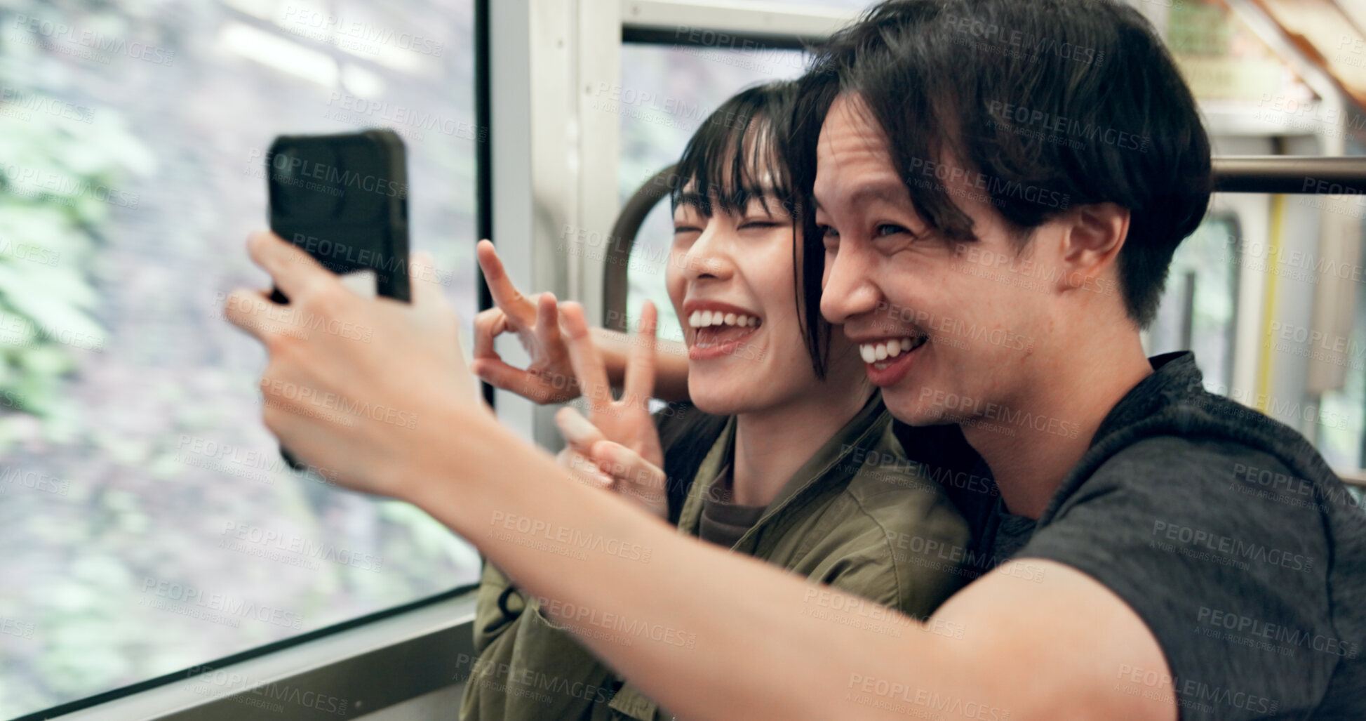 Buy stock photo Couple, travel and happy with selfie in transport for holiday memory, peace sign and profile picture update. People, bonding and hug in cable car for vacation adventure and social media post in Japan