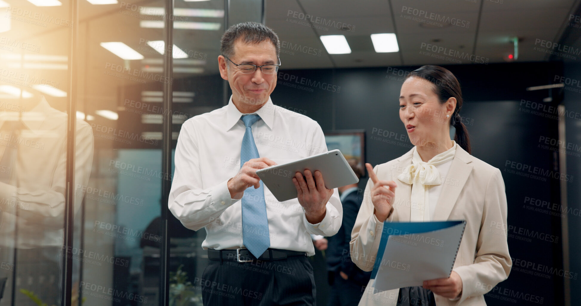 Buy stock photo Tablet, walking or business people in meeting with legal advisor for court case, documents or research. Portfolio, online or lawyer in office with attorney, feedback or paperwork at law firm in Japan