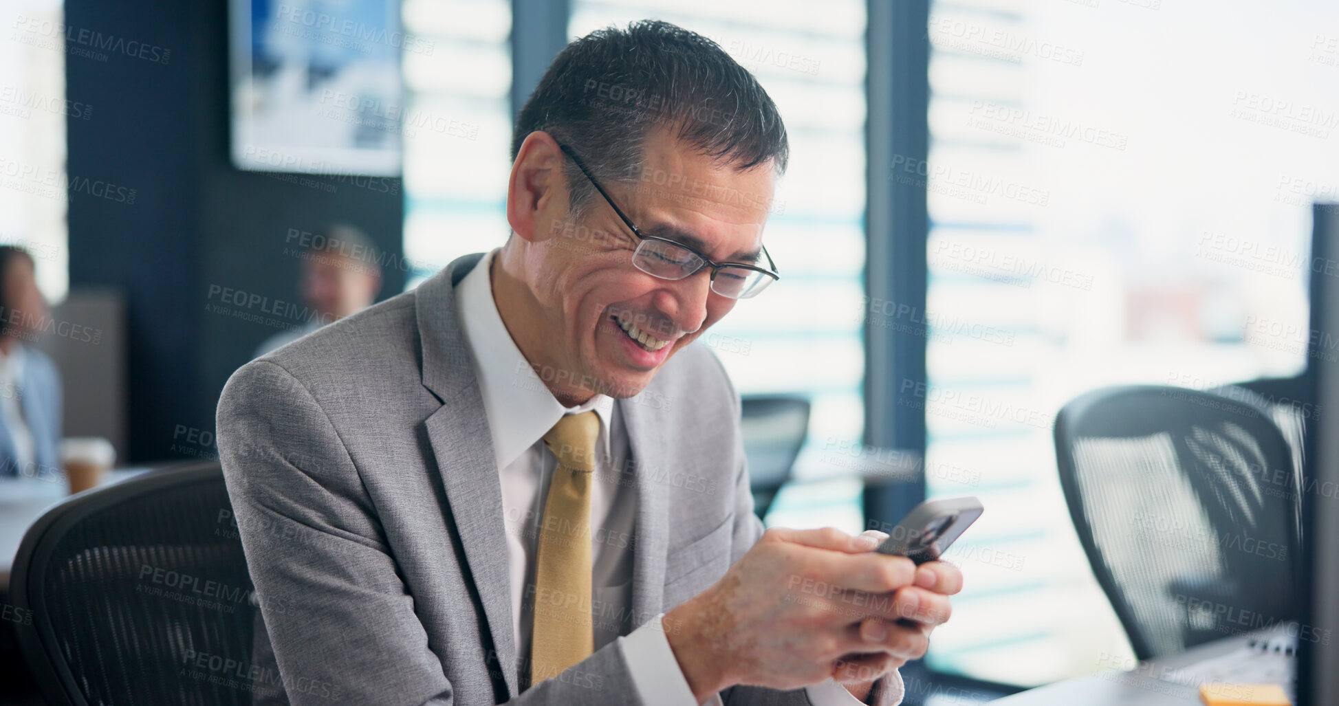 Buy stock photo Phone, happy and mature businessman in office with report for email with client communication. Laugh, cellphone and financial planner with contact for online investment profit or revenue in Japan.