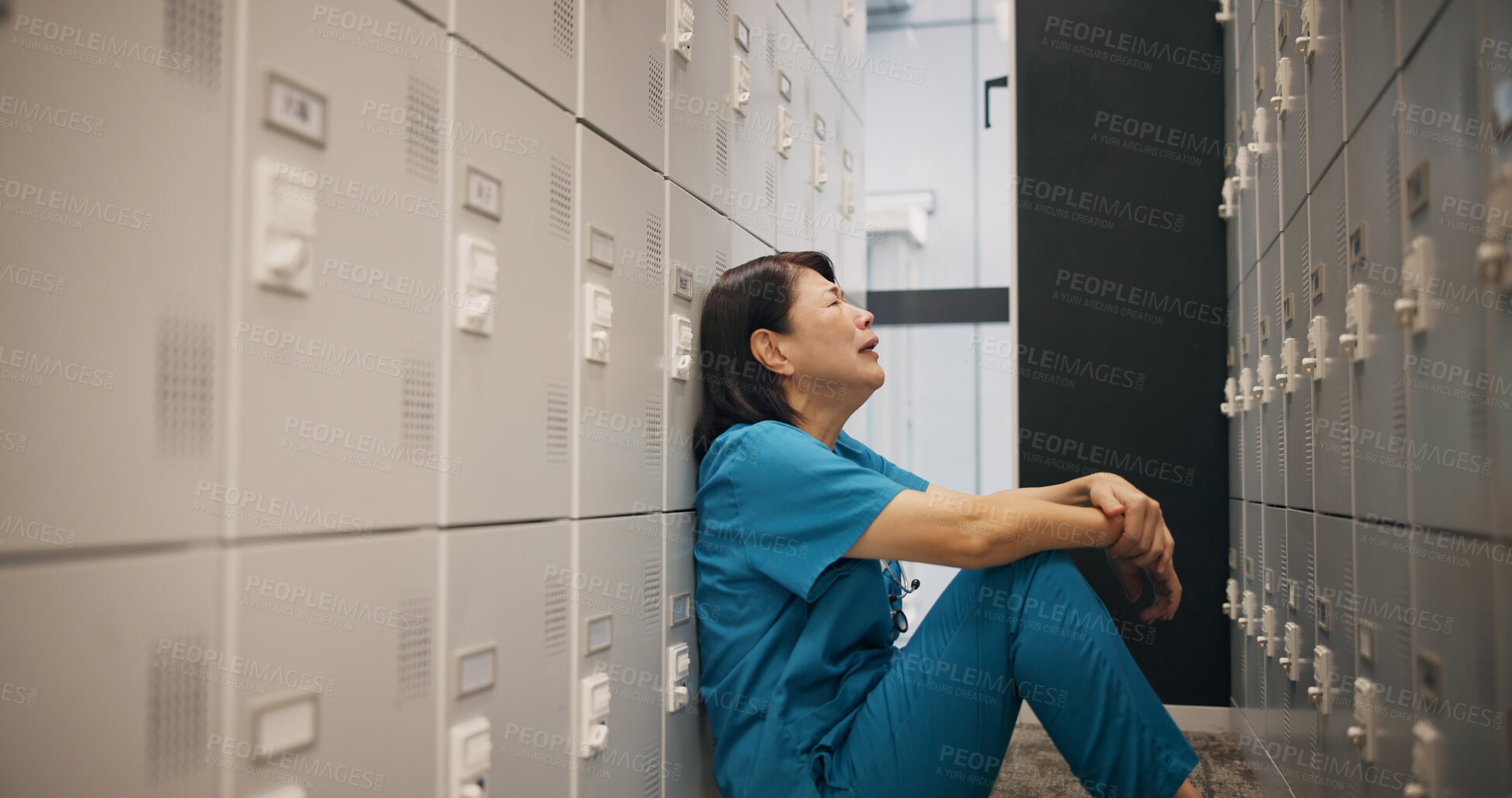 Buy stock photo Stress, woman and doctor crying in hospital with healthcare mistake, error or fail in treatment. Upset, burnout and female medical worker with grief for patient loss in surgery at clinic in Japan.