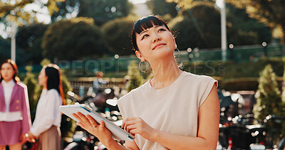 Buy stock photo Inspiration, tablet and thinking with business woman outdoor in Japan for planning or research. Future, idea and vision with happy Japanese employee in green park for app or social media browsing