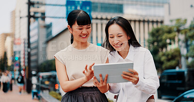 Buy stock photo Business women, tablet and friends in street with smile for notification, good news or excited for deal. People, partnership and digital touchscreen on application in city, happy or commute in Japan