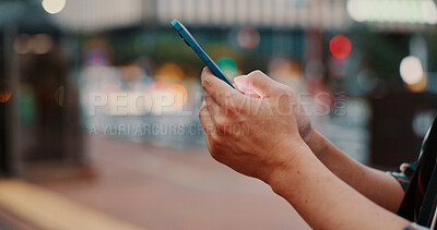 Buy stock photo City, hands and scroll with smartphone outdoor with night, playing game and browsing social media online. Japanese person, phone or internet search for travel schedule, web information or chat space