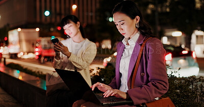 Buy stock photo Night, woman and laptop in city for business, research deadline and connectivity in Yokohama. Japanese workaholic, typing or computer on dark sidewalk for late work, commitment or networking at bokeh