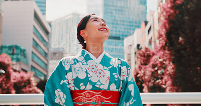 Buy stock photo City, smile and woman with kimono, thinking and outdoor sightseeing adventure in traditional fashion. Urban culture, identity and girl in Japanese clothes, happy face and morning travel in low angle