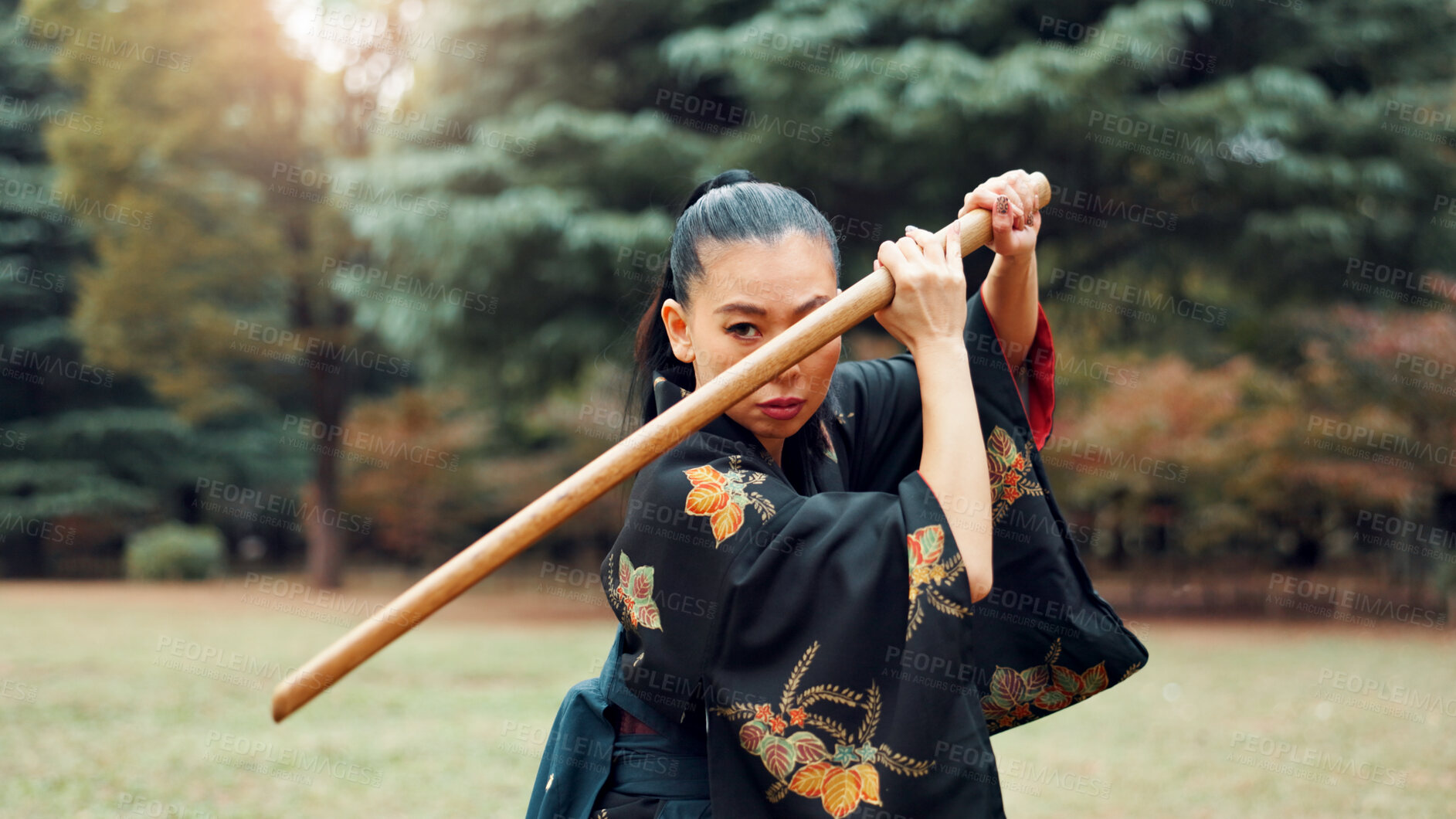 Buy stock photo Nature, martial arts and Asian woman with bamboo sword in park for technique, Kendo practice and exercise. Culture, bokuto and person with shinai for skills, fitness and traditional heritage in Japan