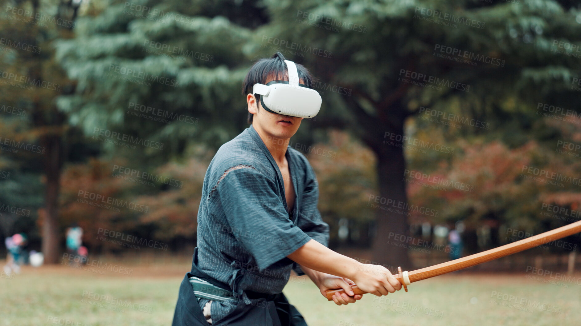 Buy stock photo Virtual reality, bamboo sword and Asian man for martial arts, Kendo practice and exercise. Culture, heritage and person with shinai, VR tech and goggles for skills, fight and training in Japan