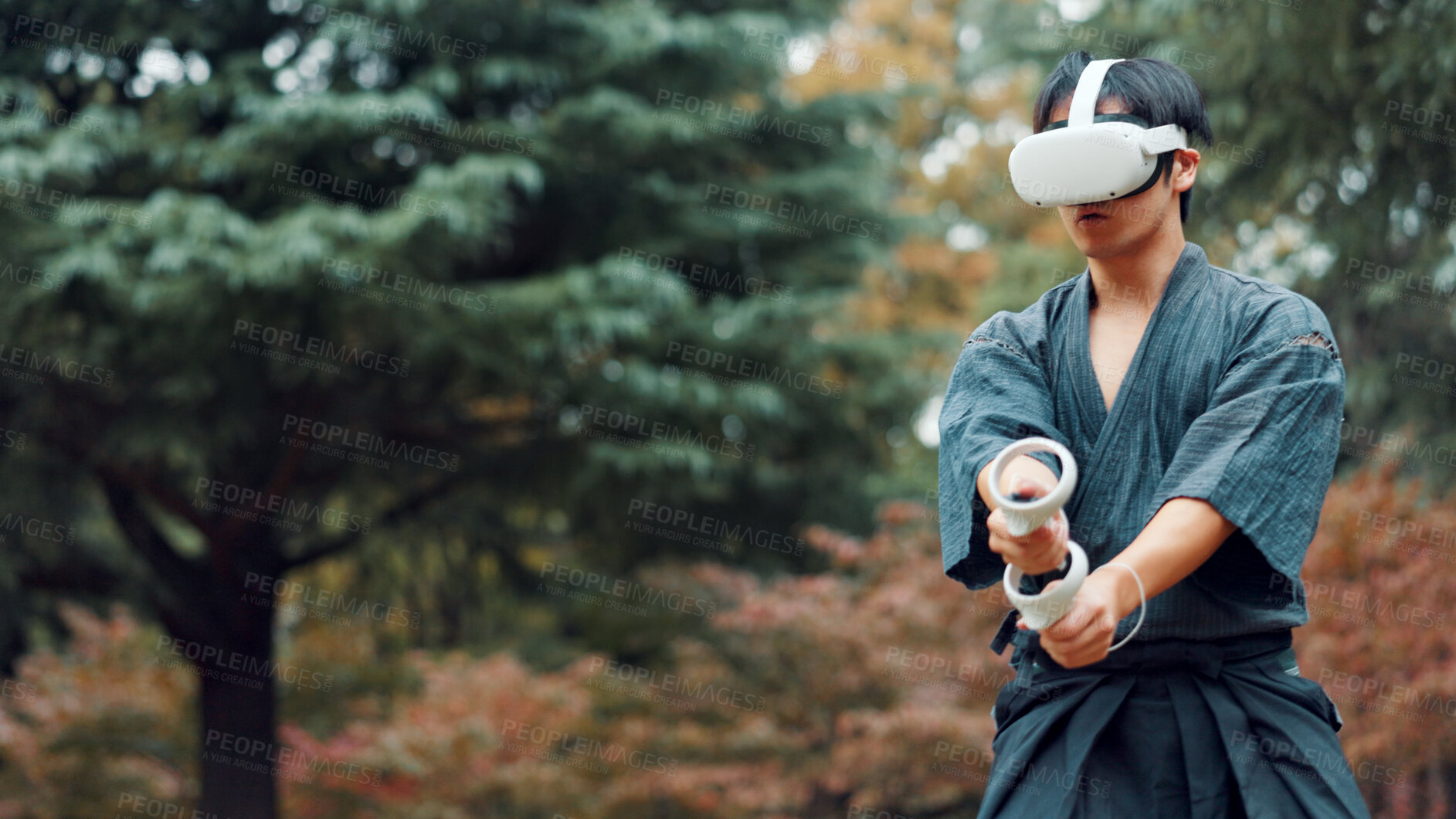 Buy stock photo Virtual reality, controller and Asian man with technology for martial arts, Kendo practice and exercise. Culture, Japan and person with shinai, VR goggles and metaverse for skill, fight and training