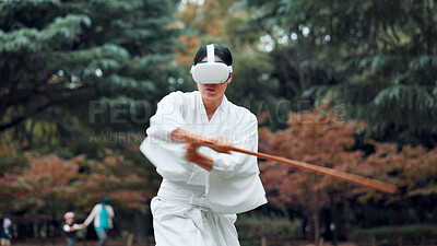 Buy stock photo Virtual reality, sword and Asian woman for martial arts, Kendo practice and exercise in nature. Culture, metaverse and person with shinai, VR tech and goggles for skill, fight and training in Japan