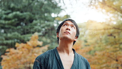 Buy stock photo Health, martial arts and thinking with Japanese man in forest for exercise, fitness or training. Culture, heritage and tradition with Samurai in nature for Aikido or Karate idea and vision as warrior