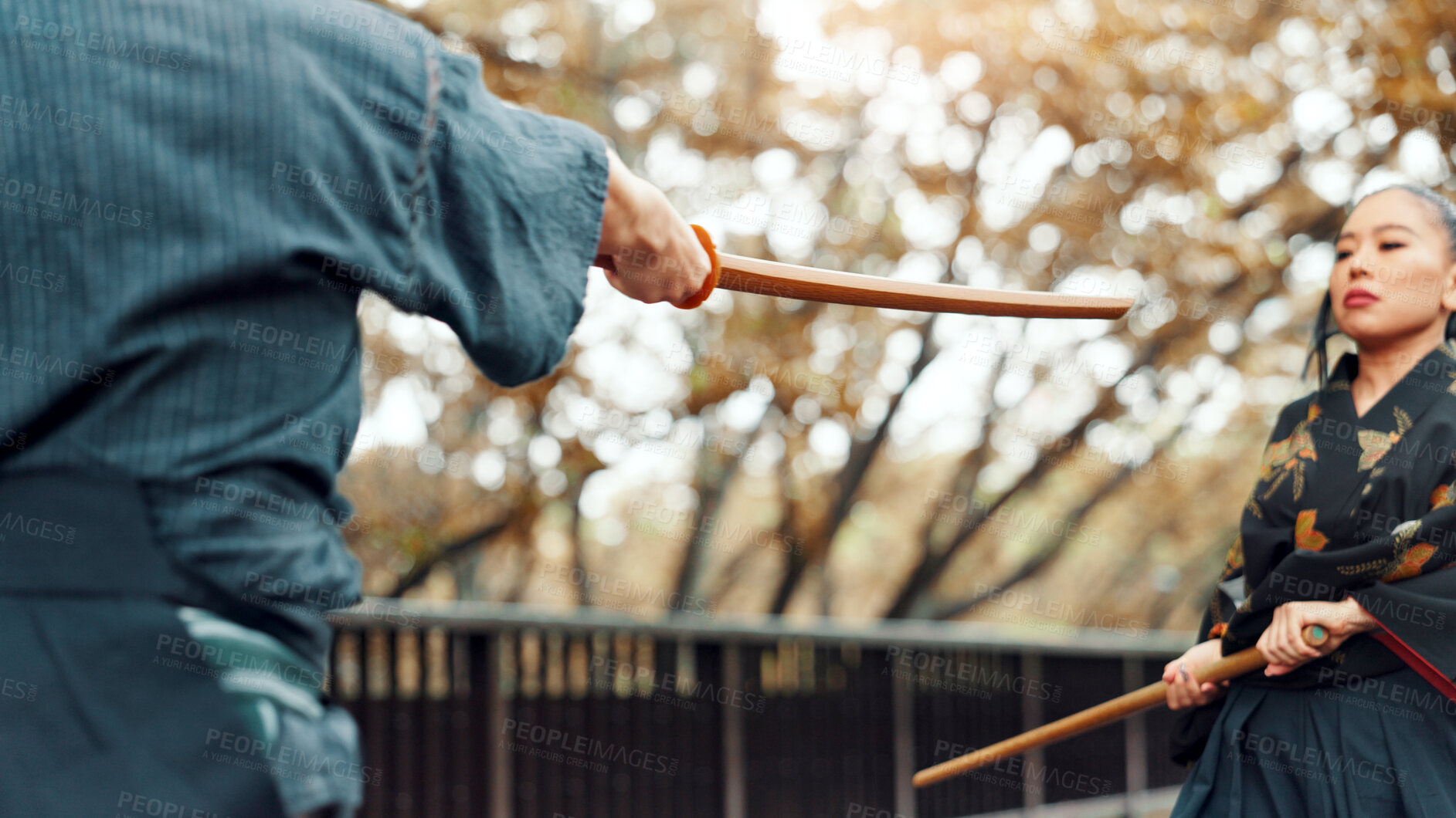 Buy stock photo Sensei, bamboo sword and Asian woman in city for martial arts, Kendo practice and exercise. Culture, Japan heritage and person and trainer with shinai, bokuto and weapon for skill, fight and training