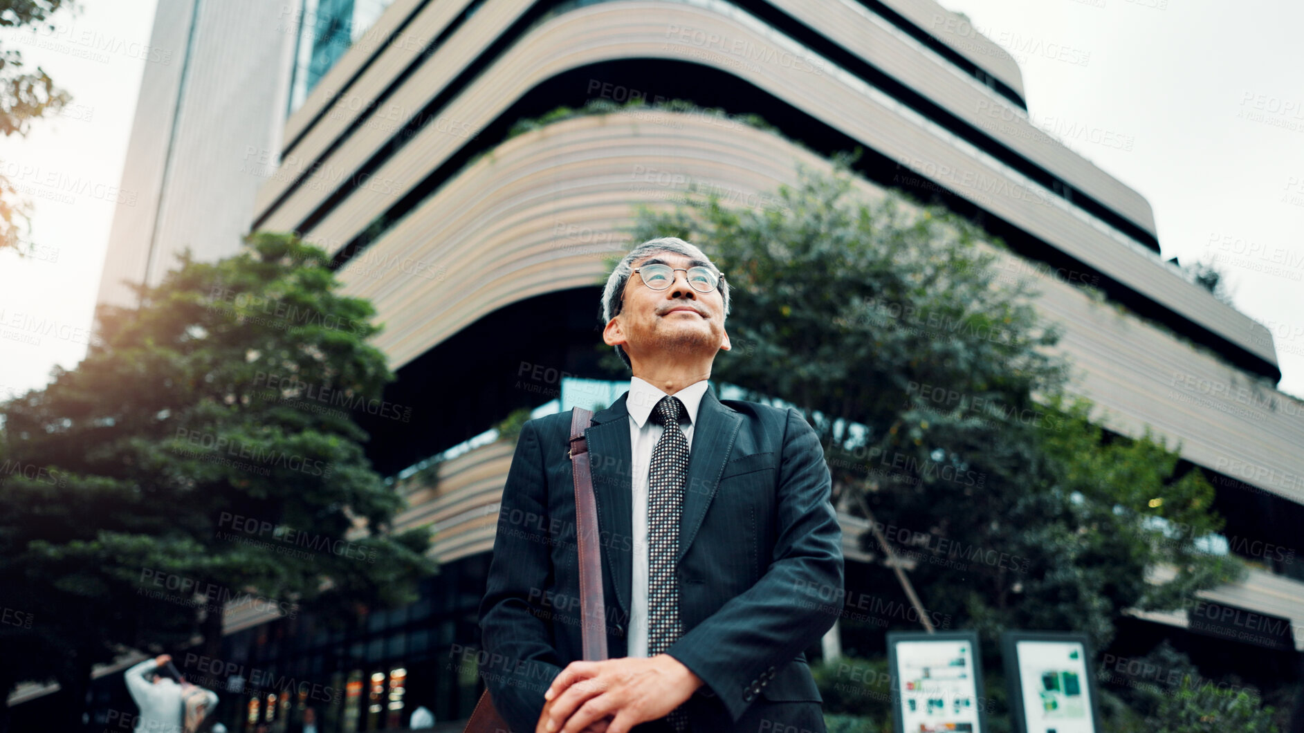 Buy stock photo Mature, business man and walking in town for morning commute, journey to work and travel with bag. Japanese professional, commuter and trip to job, corporate career and sightseeing outdoor in city