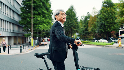 Buy stock photo Corporate, man and walking with ebike in city for sustainable transport, eco friendly and carbon neutral travel. Mature person, electric bicycle and morning commute, urban journey and Japan adventure