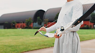 Buy stock photo Archery, sport and hands with bow outdoor for shooting practice, martial arts tradition or getting ready. Japanese culture, person and equipment safety for kyudo, precision lesson and start training