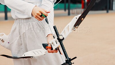 Buy stock photo Hands, archer and bow for training, skills and preparing for competition, equipment and outdoor for game. Contest, athlete and practice from tournament, arrow and challenge for person in Japan