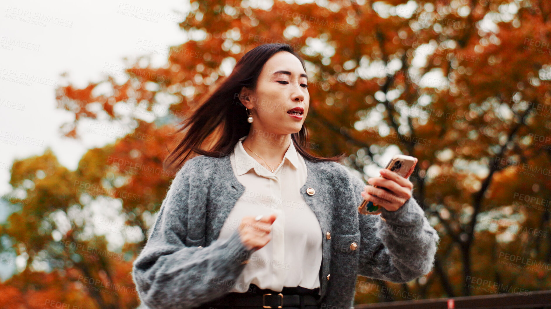 Buy stock photo Phone, late woman and running with time check, park bride and rush for job in city. Japanese person, professional stress and schedule issue with work, appointment and overtime for autumn morning