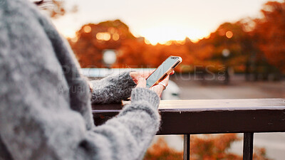 Buy stock photo Hands, phone and woman at park for travel, text and message on app in Japan. Closeup, mobile and female person outdoor for chat, communication and post on social media profile on internet at sunset