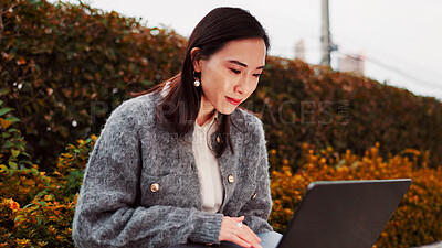 Buy stock photo Japanese woman, laptop and bench outdoors for writing, remote work and online email for copywriter. Thinking, park and digital writer with creative project, typing and job in Tokyo with technology