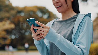 Buy stock photo Hands, woman and typing with phone of fitness outdoor, communication and research of exercise application. Happy, athlete and mobile for gym membership, training schedule and workout routine in Japan