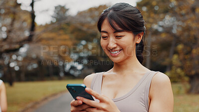 Buy stock photo Active, woman and typing with phone for fitness outdoor, communication and research of sports application. Happy, athlete and mobile for gym membership, training schedule and workout routine in Japan