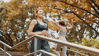 Buy stock photo Happy, stairs and running with Japanese woman in city for health, athlete and fitness exercise. Wellness, cardio and training with person on steps in Japan outdoors for workout, sports and marathon