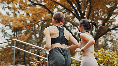 Buy stock photo Women, running and support with health in park, fitness and outdoor nature for exercise teamwork. People, urban garden and friends training together for marathon, back and cardio workout in Japan