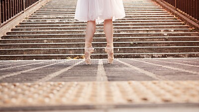 Buy stock photo Woman, feet and ballet dancing in city, outdoor and practice performance for art of balance. Female person, professional dancer and creative talent in Japan, rehearsal and urban town for elegance