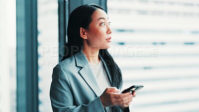 Buy stock photo Woman, phone and thinking at window for business, research economy and review in Japanese company. Finance investor, idea and mobile in office for report, stock market feedback and career development