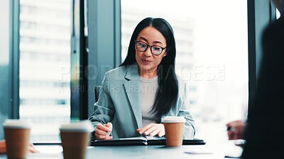 Buy stock photo Office, employees and businesswoman with writing for report, policy review and feedback for law firm. Japan, teamwork and lawyers with advocate for court case signature, documents or justice progress