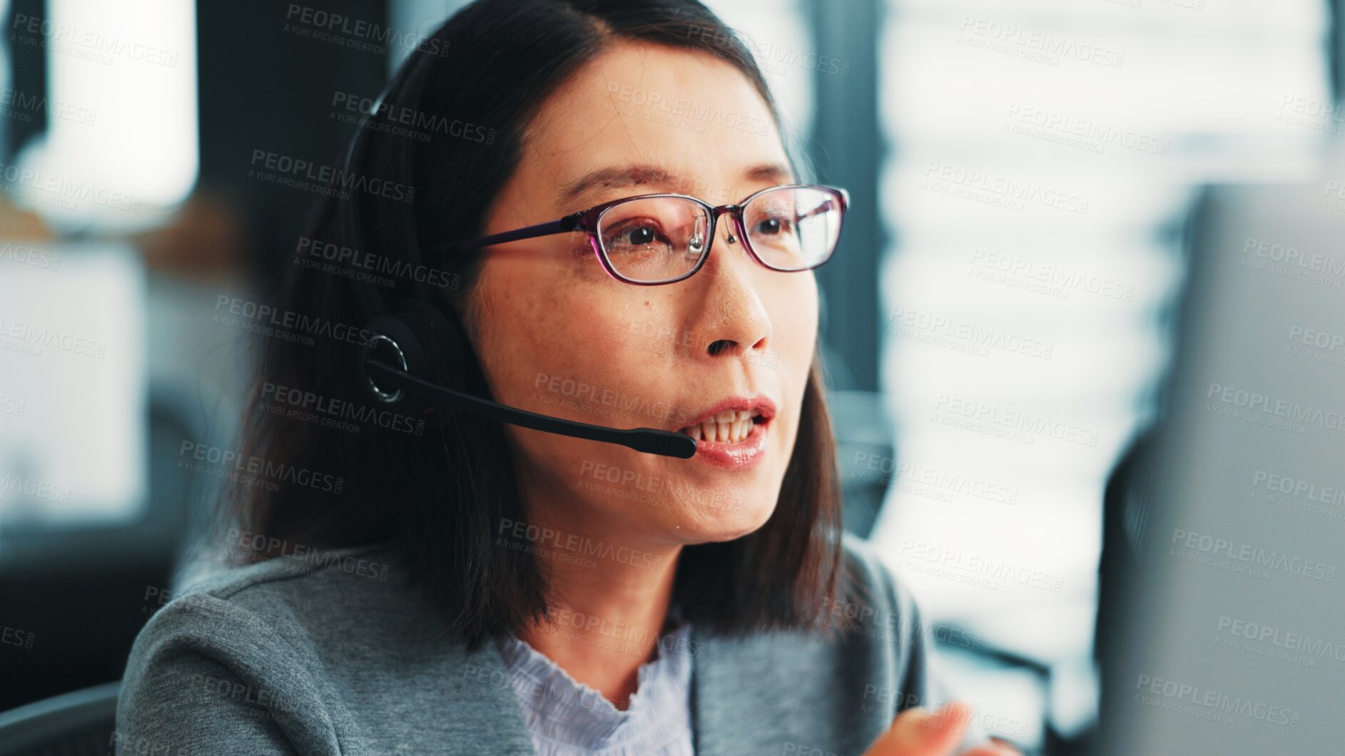 Buy stock photo Woman, computer operator and customer support agent in office, talk and advisor to client on web. Female person, call centre representative and helping consumer with loan in Japan insurance agency