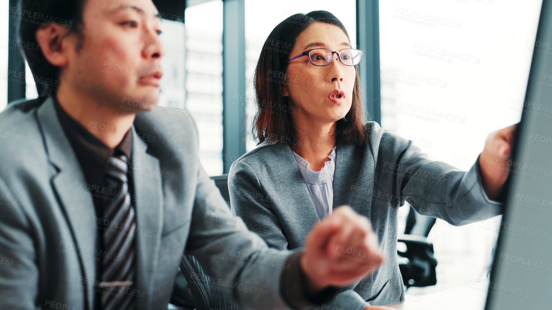 Buy stock photo Meeting, pointing and Asian business people on computer with feedback, help and review for online project. Office, corporate and worker with boss for teamwork, collaboration and discussion in Japan