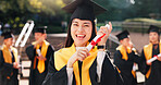 Woman, university student and excited with certificate for graduation, celebration and achievements in Japan. Female person, college graduate and happy on portrait with scroll for academic success