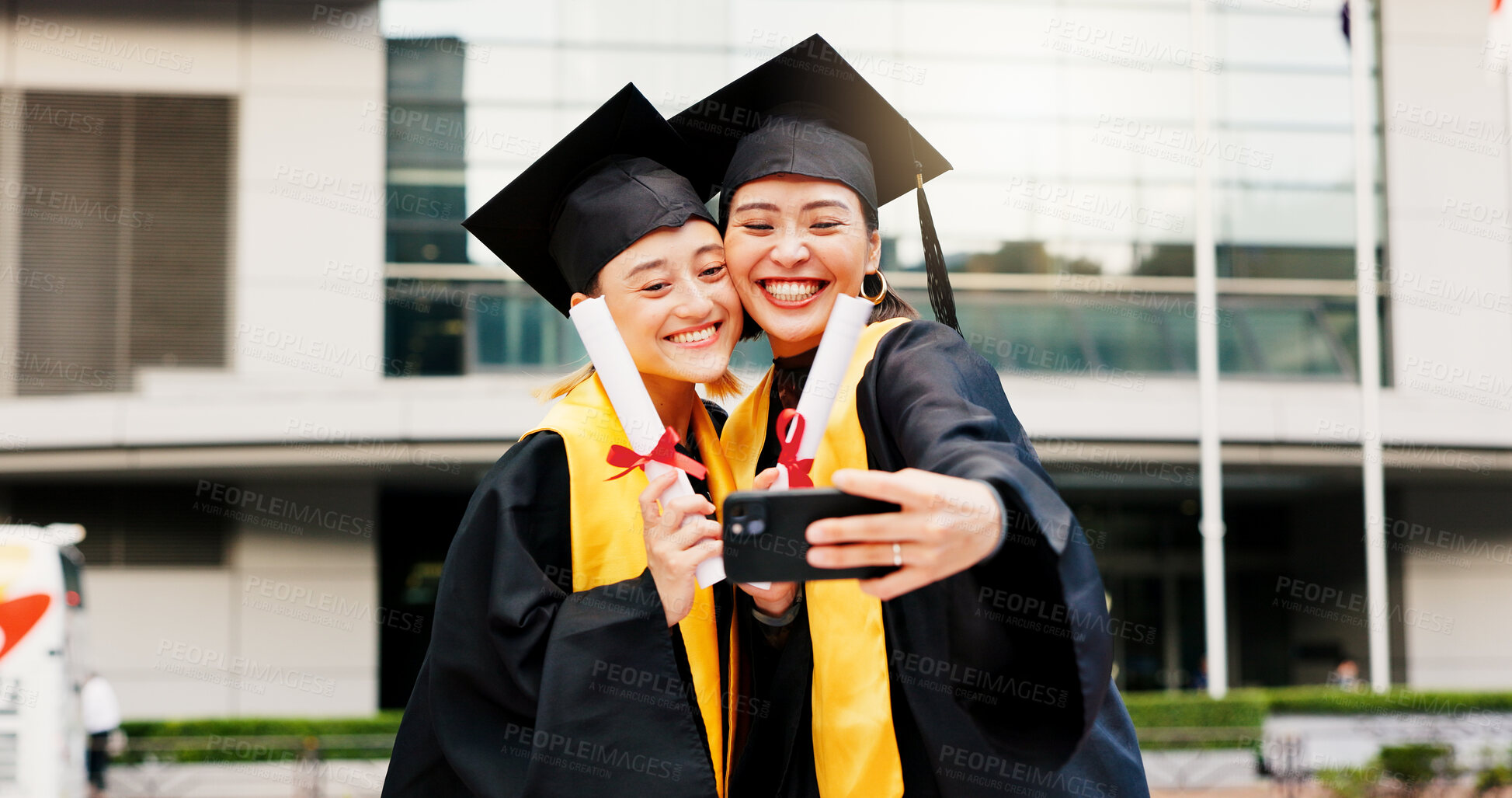 Buy stock photo Women, college student and happy on graduation with selfie for social media or profile picture in Japan. People, campus and smile with scroll for memories, success and achievement as friends