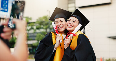 Buy stock photo Students, women or hug for graduation or picture on campus to celebrate success together. Happy, photo memory or university graduates with friends, education goal or certificate approval in Japan