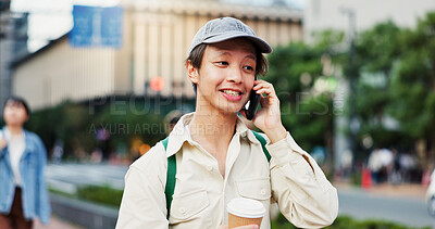 Buy stock photo Street, male student and phone call with coffee for university communication or happy for application feedback. Japanese person, smile or talking to contact for discussion and scholarship information