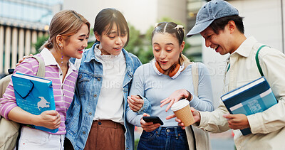 Buy stock photo Students, friends and laughing with phone on campus for social media meme, streaming funny video or online news. Japanese university, people or smartphone for internet gossip, learning break or relax