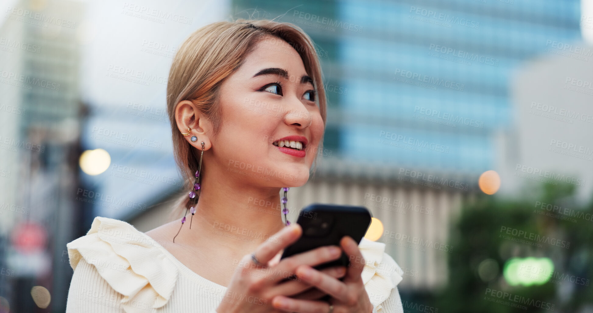 Buy stock photo Thinking, phone and Japanese woman in city on location, street road or holiday adventure journey in Tokyo. Night, travel ideas and happy girl with smile or mobile app for trip, navigation and map