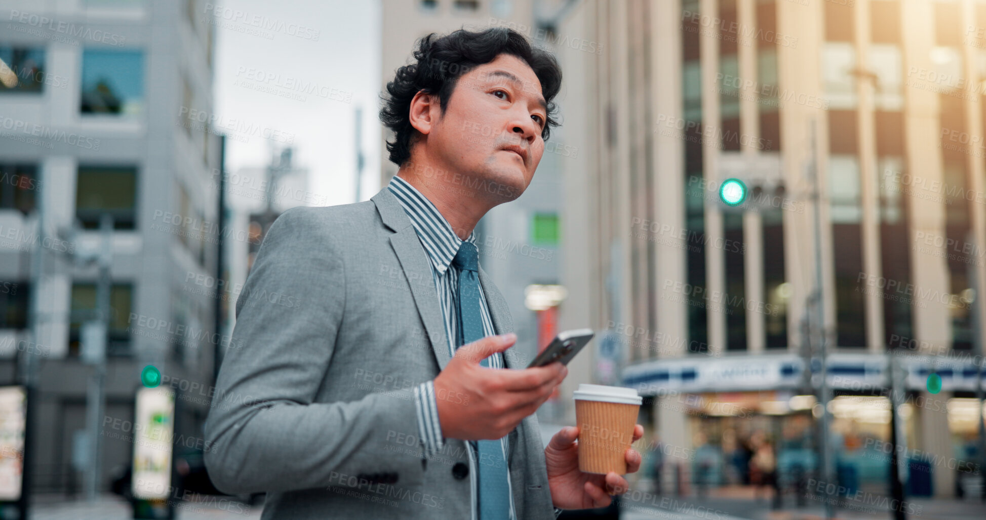 Buy stock photo Asian, businessman and waiting with phone for transport, taxi or cab in city for business trip or commute. Japan, man or traveler looking for ride on travel app or mobile smartphone in an urban town 