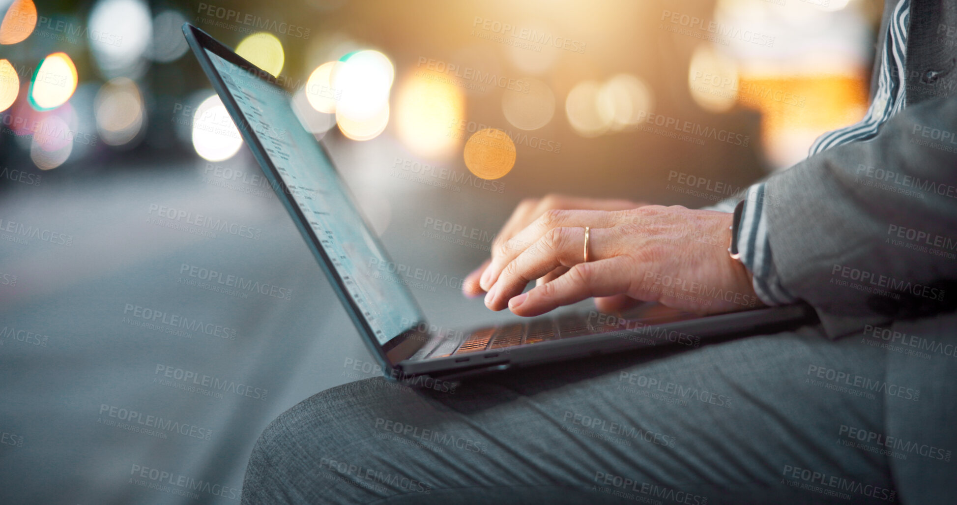 Buy stock photo Business person, hands and night with laptop in city for research, communication or email. Japan, closeup or freelancer working late with computer or street lights for network or connection in town