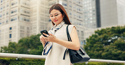 Buy stock photo Japan, business and woman in city, smartphone and smile with connection, travel and internet. Asian person, outdoor and girl with cellphone, communication or social media with message to contact