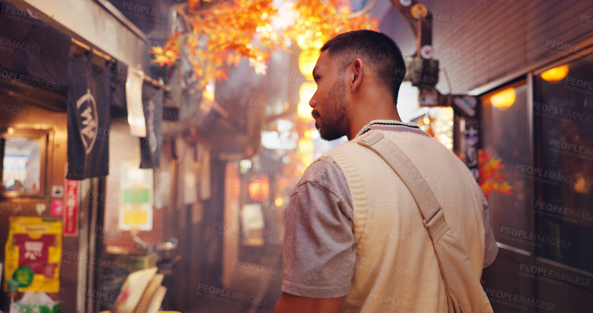 Buy stock photo Night market, back and travel with Japanese man in city for shopping, vacation and festival. Culture, traditional holiday and walking with person in alley for Street food, tourism and heritage